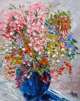 MIXED FLOWERS IN A BLUE VASE