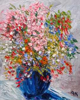 MIXED FLOWERS IN A BLUE VASE